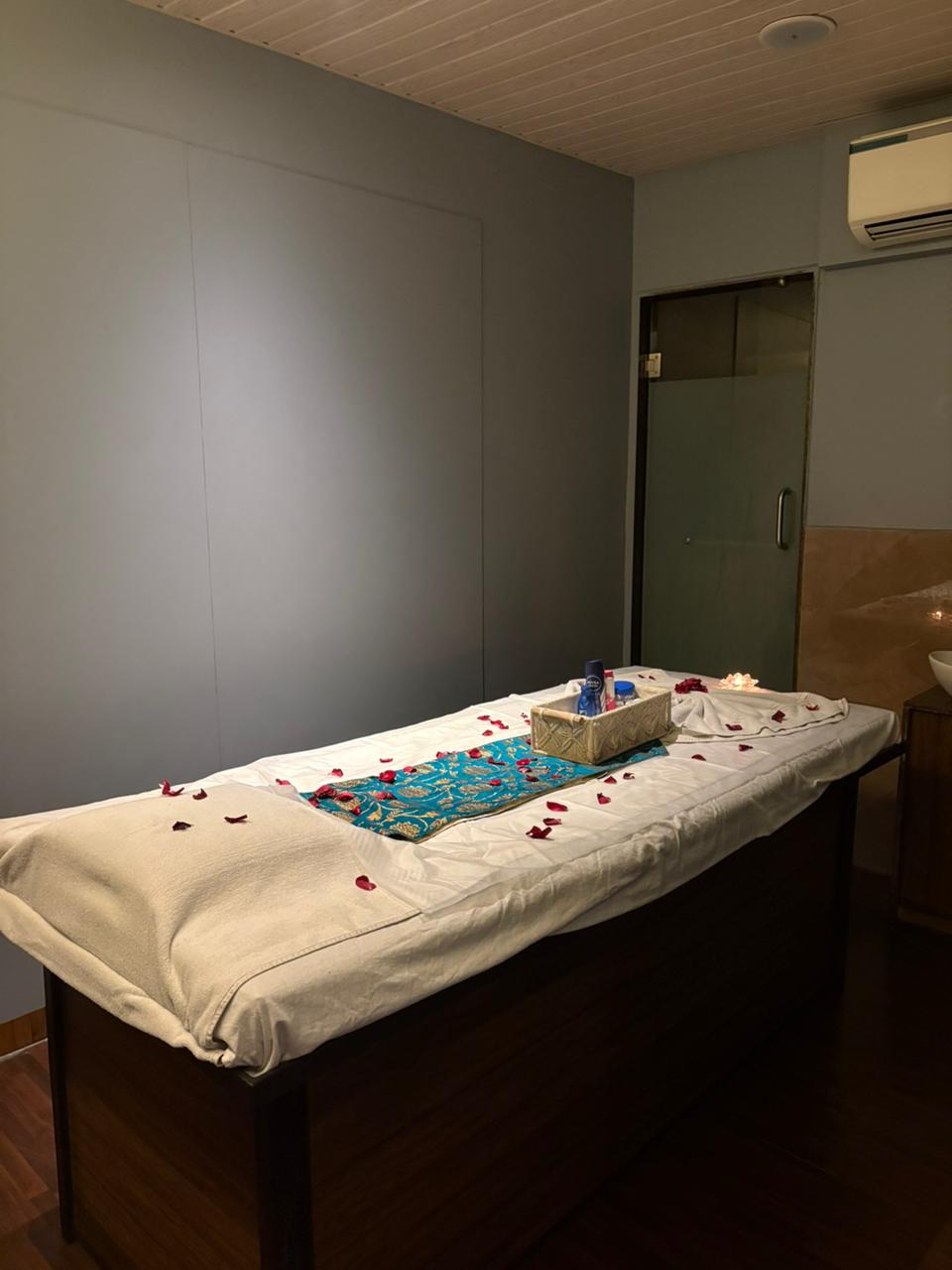 Candlelit couples treatment room at Mitram Luxury Spa