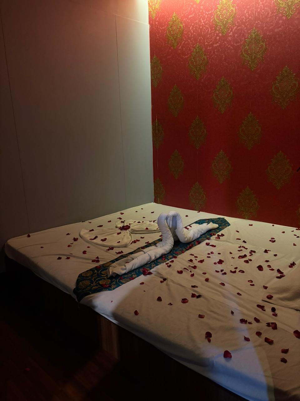 Warm candlelit treatment room at Mitram Luxury Spa in Marol, Andheri East